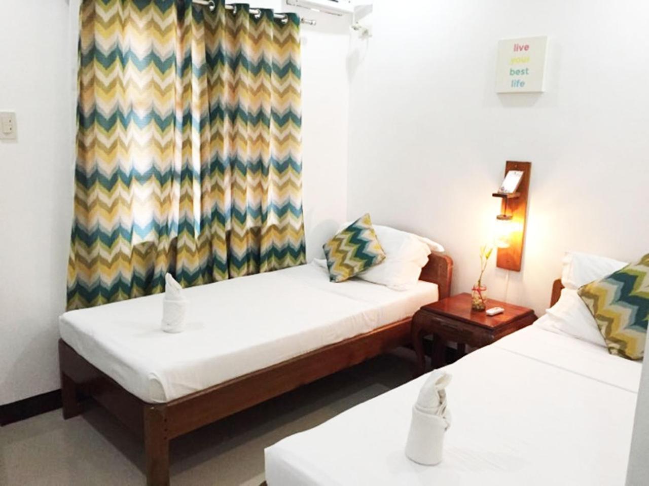 A&J Pension Puerto Princesa Екстер'єр фото